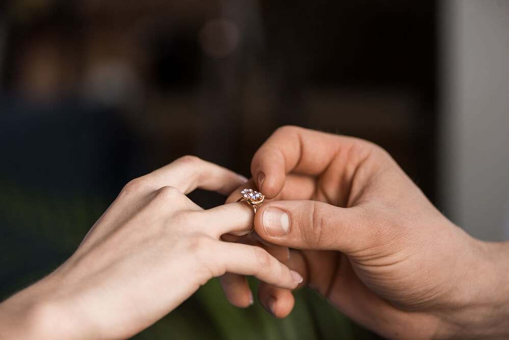 Cropped image of boyfriend proposing girlfriend - Shira Diamonds