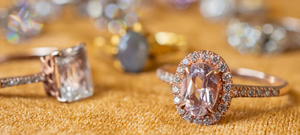 Jewelry diamond rings on golden fabric - Shira Diamonds